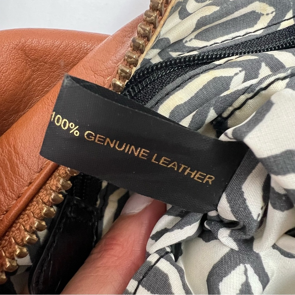 Rebecca Minkoff tan leather crossbody bag with zippers and gold details. - Picture 9 of 13